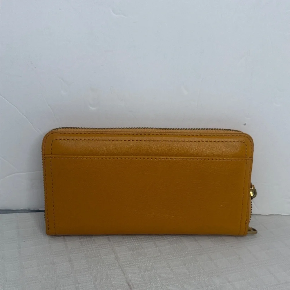 Margot Anna Zip Around Leather Wallet in marigold yellow.
